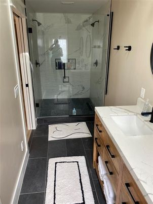 Bathroom, Dual Sink Vanities, Glass Shower, Interior, Marble Walls