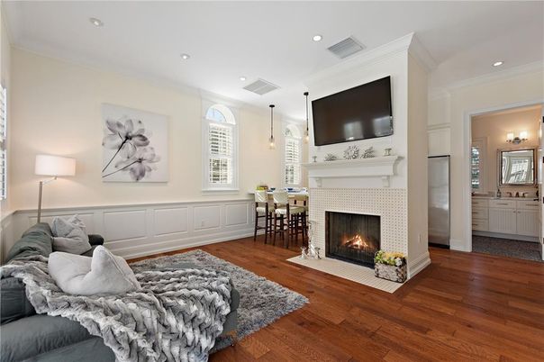 Dining room, Fireplace, Interior, Living room, Pendant Lights, Recessed Lighting, Wood Texture Flooring