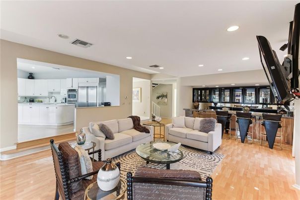 Dining room, Interior, Kitchen, Living room, Recessed Lighting, Stainless Steel Appliances, Wood Texture Flooring