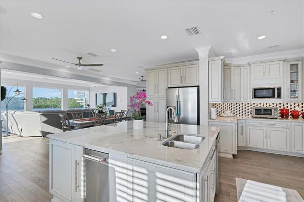 Dining room, Interior, Kitchen, Living room, Recessed Lighting, Stainless Steel Appliances, Wood Texture Flooring