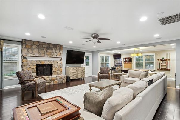 Fireplace, Interior, Living room, Pendant Lights, Recessed Lighting, Stone Walls, Wood Texture Flooring