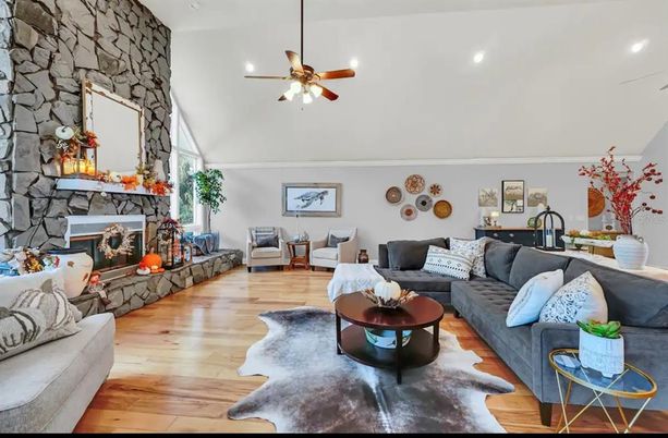 Fireplace, Interior, Living room, Recessed Lighting, Stone Walls, Wood Texture Flooring