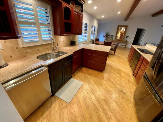 Dining room, Interior, Kitchen, Recessed Lighting, Stainless Steel Appliances, Wood Texture Flooring