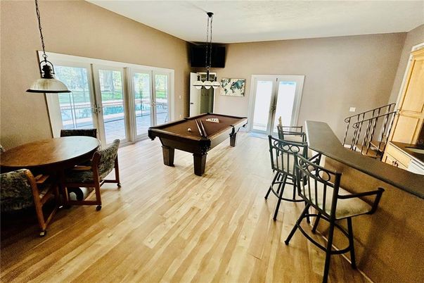 Billiard Table, Dining room, Game Room, Interior, Pendant Lights, Wood Texture Flooring