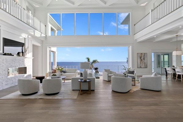 Dining room, Fireplace, Interior, Living room, Pendant Lights, Water, Wood Texture Flooring