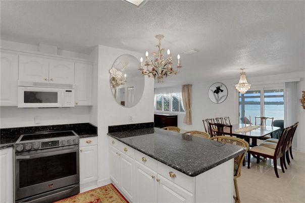 Chandelier, Dining room, Interior, Kitchen, Water