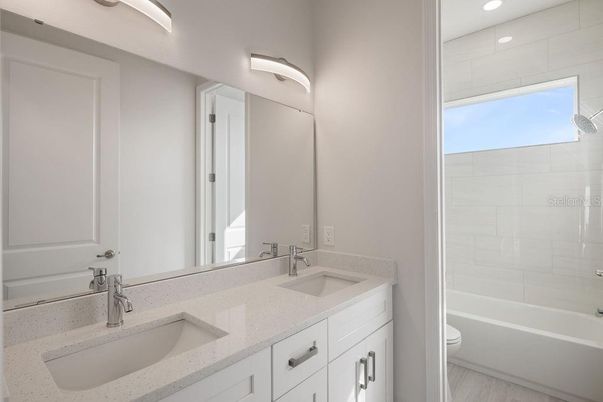 Bathroom, Dual Sink Vanities, Interior, Recessed Lighting, Wood Texture Flooring