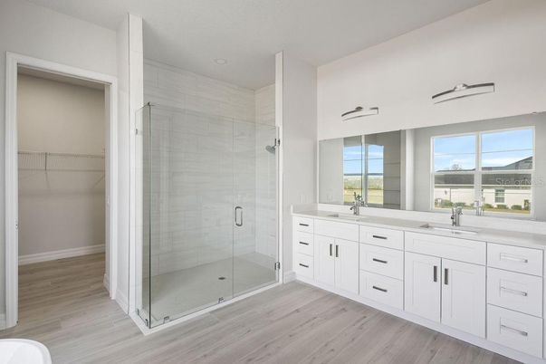 Bathroom, Dual Sink Vanities, Glass Shower, Interior, Walk-in Closets, Wood Texture Flooring