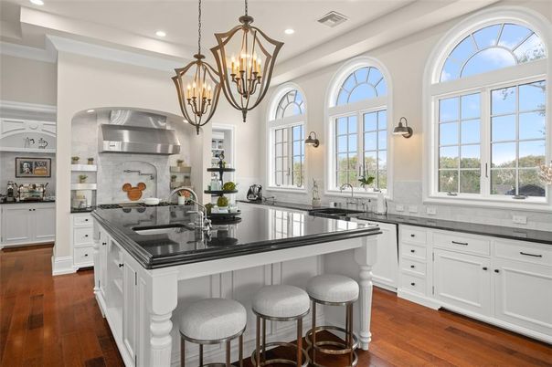 Chandelier, Interior, Kitchen, Pendant Lights, Recessed Lighting, Stainless Steel Appliances, Wood Texture Flooring