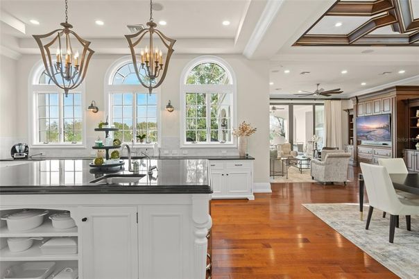 Chandelier, Dining room, Interior, Kitchen, Living room, Pendant Lights, Recessed Lighting, Wood Texture Flooring