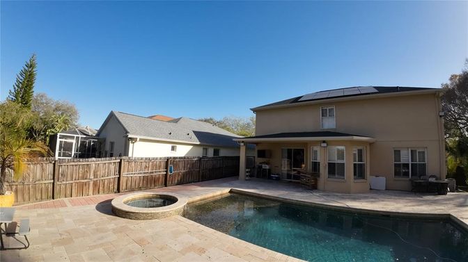 Exterior, Pool, Solar Panels