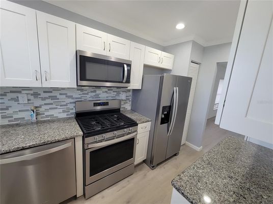 Interior, Kitchen, Recessed Lighting, Stainless Steel Appliances, Wood Texture Flooring
