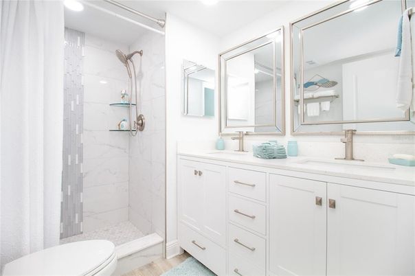 Bathroom, Glass Shower, Interior, Marble Walls, Recessed Lighting, Wood Texture Flooring