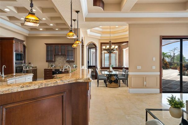 Chandelier, Dining room, Interior, Kitchen, Pendant Lights, Recessed Lighting, Stainless Steel Appliances
