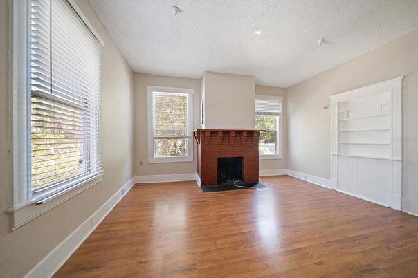 Empty room, Fireplace, Interior, Recessed Lighting, Wood Texture Flooring