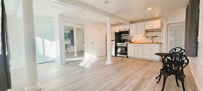 Interior, Kitchen, Recessed Lighting, Stainless Steel Appliances, Wood Texture Flooring