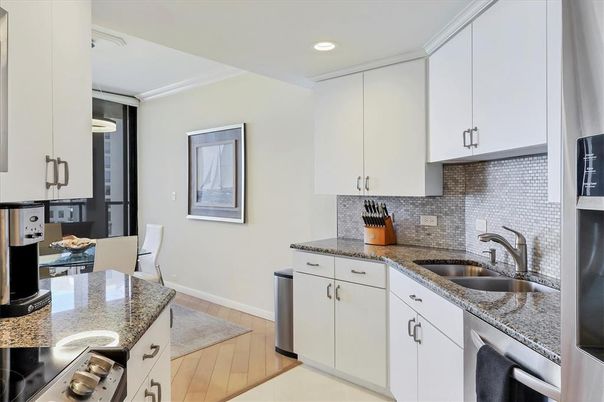 Dining room, Interior, Kitchen, Recessed Lighting, Stainless Steel Appliances, Wood Texture Flooring
