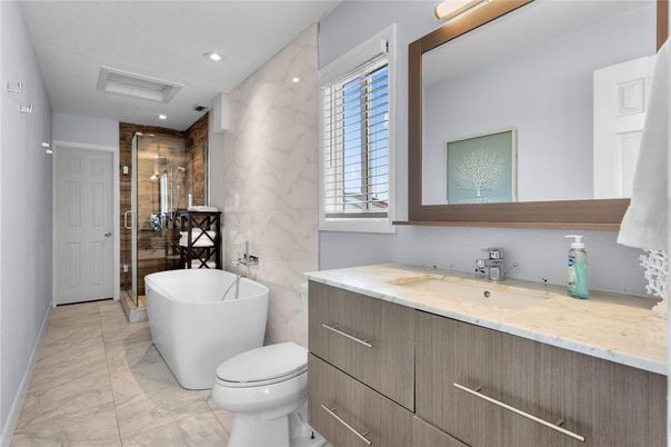Bathroom, Free Standing Baths, Glass Shower, Interior, Marble, Marble Walls, Recessed Lighting
