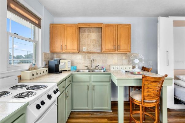 Interior, Kitchen, Tile Countertops, Wood Texture Flooring