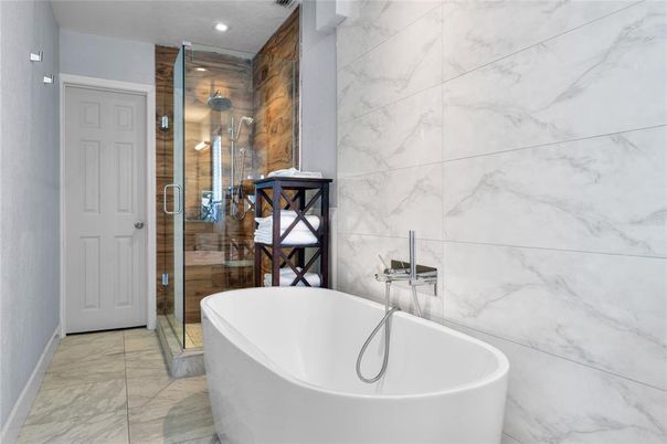 Bathroom, Free Standing Baths, Glass Shower, Interior, Marble, Marble Walls, Recessed Lighting