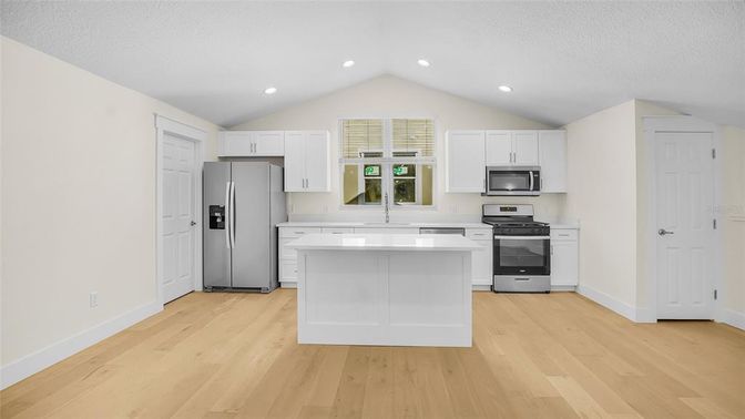 Interior, Kitchen, Recessed Lighting, Stainless Steel Appliances, Wood Texture Flooring