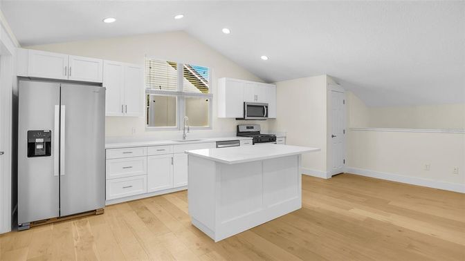 Interior, Kitchen, Recessed Lighting, Stainless Steel Appliances, Wood Texture Flooring