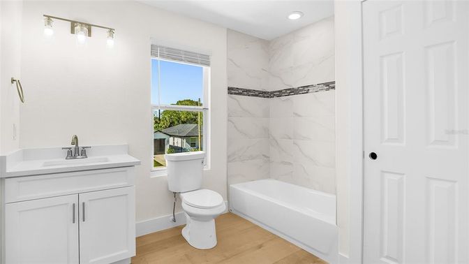 Bathroom, Interior, Marble Walls, Recessed Lighting, Wood Texture Flooring