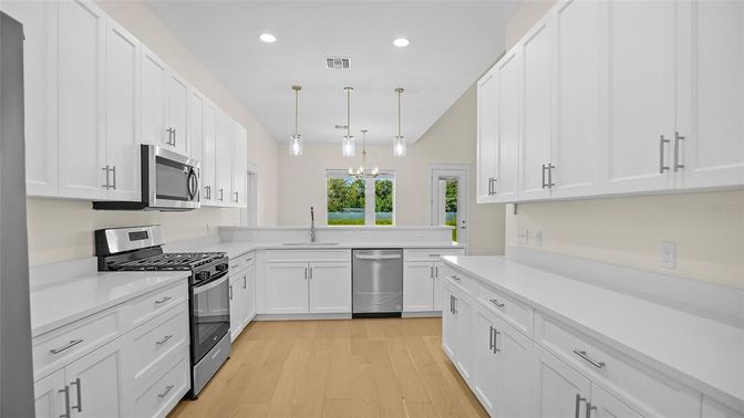 Interior, Kitchen, Pendant Lights, Recessed Lighting, Stainless Steel Appliances, Wood Texture Flooring