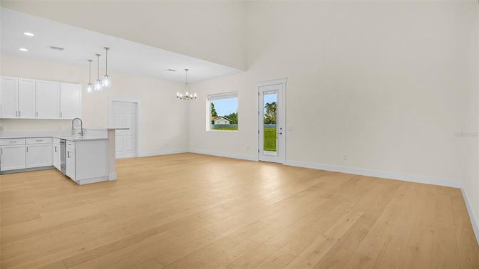 Chandelier, Empty room, Interior, Kitchen, Pendant Lights, Recessed Lighting, Wood Texture Flooring