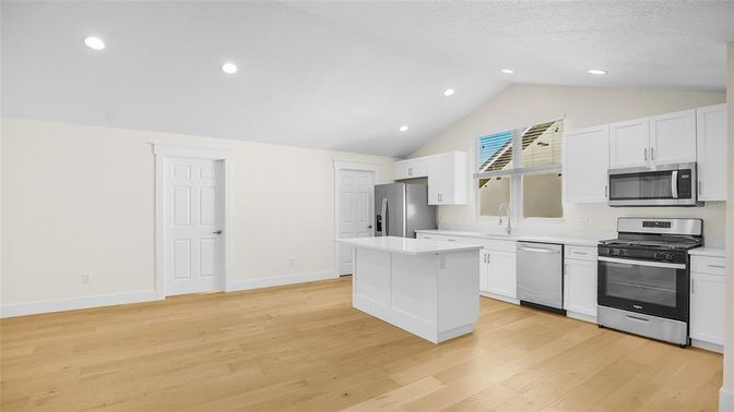 Interior, Kitchen, Recessed Lighting, Stainless Steel Appliances, Wood Texture Flooring