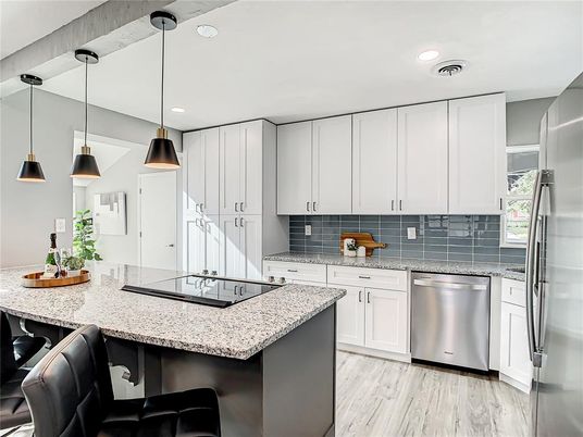 Interior, Kitchen, Pendant Lights, Recessed Lighting, Stainless Steel Appliances, Wood Texture Flooring