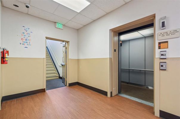 Elevator, Interior, Wood Texture Flooring