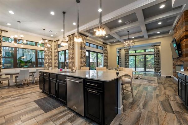 Chandelier, Dining room, Interior, Kitchen, Pendant Lights, Recessed Lighting, Stainless Steel Appliances, Wood Texture Flooring