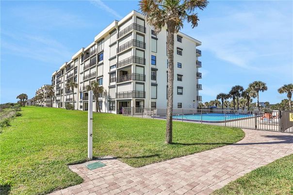 Backyard, Exterior, Facade, Pool, Condo Building