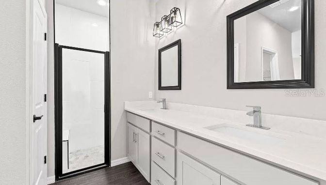 Bathroom, Dual Sink Vanities, Interior, Recessed Lighting, Wood Texture Flooring