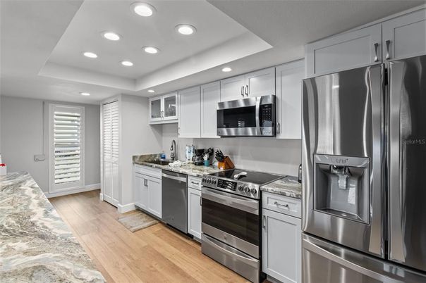 Interior, Kitchen, Recessed Lighting, Stainless Steel Appliances, Wood Texture Flooring