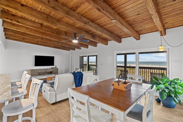 Dining room, Interior, Living room, Pendant Lights, Water, Wooden Beams, Wooden Ceilings, Wood Texture Flooring