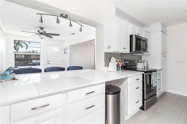 Interior, Kitchen, Tile Countertops, Wood Texture Flooring