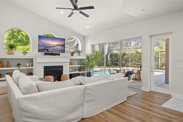 Fireplace, Interior, Living room, Recessed Lighting, Wood Texture Flooring