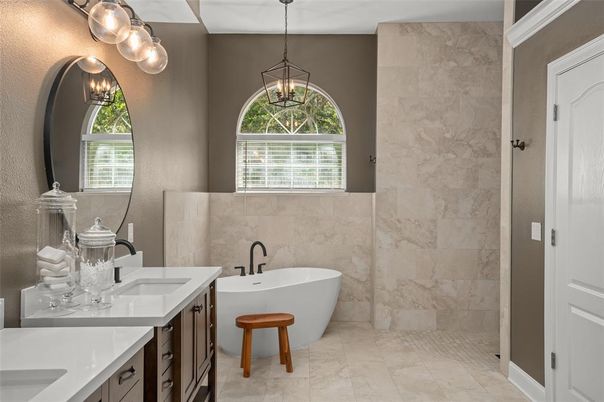 Bathroom, Dual Sink Vanities, Free Standing Baths, Interior, Marble, Marble Walls, Pendant Lights