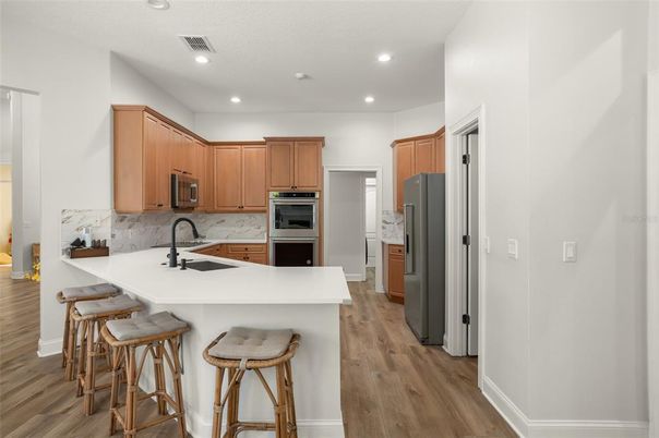 Interior, Kitchen, Recessed Lighting, Stainless Steel Appliances, Wood Texture Flooring