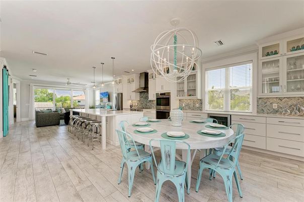 Chandelier, Dining room, Interior, Kitchen, Living room, Pendant Lights, Recessed Lighting, Wood Texture Flooring
