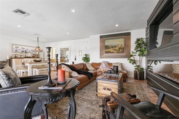 Dining room, Fireplace, Interior, Living room, Pendant Lights, Recessed Lighting, Wood Texture Flooring