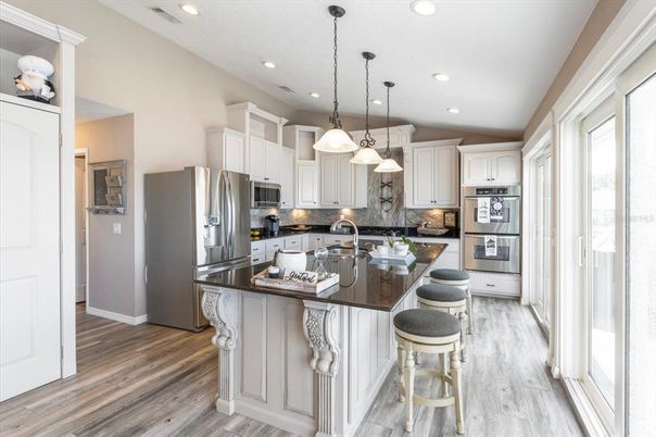 Interior, Kitchen, Pendant Lights, Recessed Lighting, Stainless Steel Appliances, Wood Texture Flooring