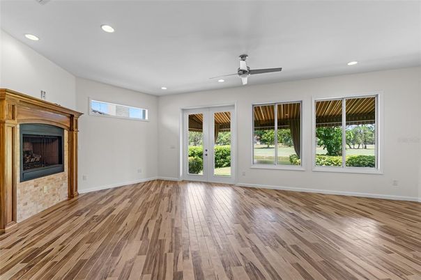 Empty room, Fireplace, Interior, Recessed Lighting, Wood Texture Flooring