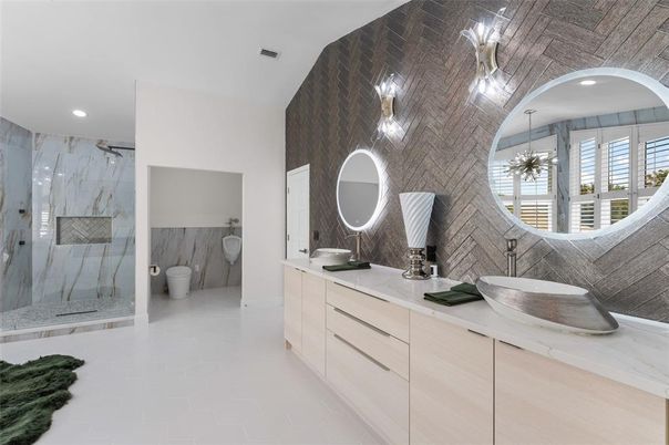 Bathroom, Dual Sink Vanities, Glass Shower, Interior, Marble Walls, Recessed Lighting