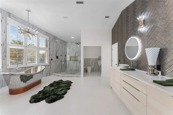 Bathroom, Dual Sink Vanities, Free Standing Baths, Glass Shower, Interior, Marble Walls, Pendant Lights, Recessed Lighting
