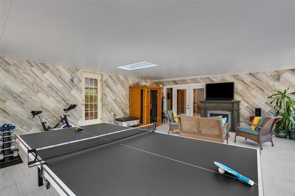 Fireplace, Fitness Equipment, Game Room, Interior, Wooden Walls