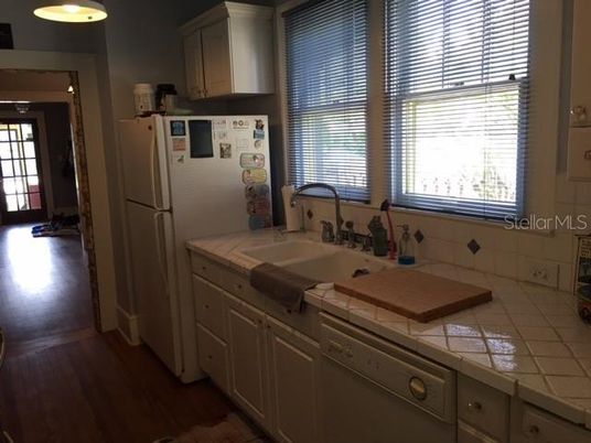 Interior, Kitchen, Tile Countertops, Wood Texture Flooring