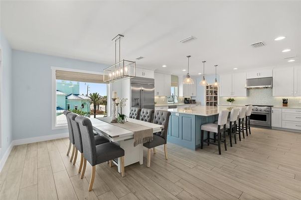 Dining room, Interior, Kitchen, Pendant Lights, Recessed Lighting, Stainless Steel Appliances, Wood Texture Flooring